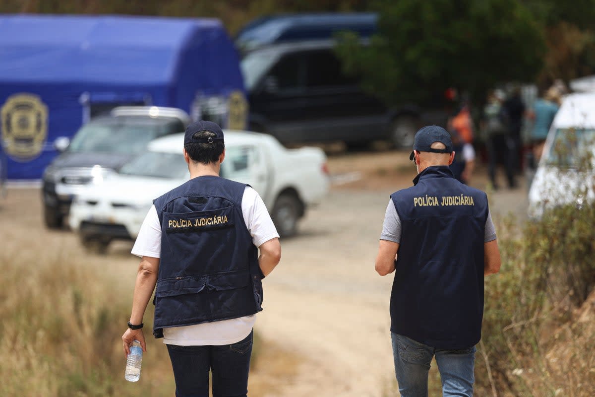 Police at the scene of the search, which is expected to last several days (AFP via Getty Images)