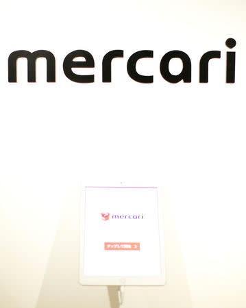 The logo of Mercari is displayed at the company's Tokyo headquarters in Tokyo, Japan, June 15, 2018. REUTERS/Issei Kato