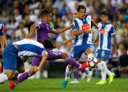 Football Soccer - Espanyol v Real Madrid - Spanish La Liga Santander - RCDE stadium, Cornella - El Prat, Spain - 18/09/16 Real Madrid's Lucas Vazquez and Espanyol's Victor Sanchez in action. REUTERS/Albert Gea