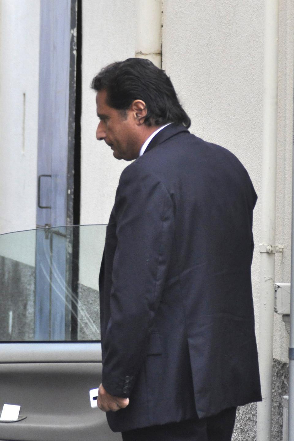 Captain Francesco Schettino arrives at the converted Teatro Moderno theater for a hearing in his trial, in Grosseto, Italy, Monday, Oct. 7, 2013. The captain of the wrecked Costa Concordia is charged with manslaughter, causing the shipwreck and abandoning ship before the luxury cruise liner's 4,200 passengers and crew could be evacuated on Jan. 13, 2012 when the ship collided with a reef off the Tuscan island of Giglio, killing 32 people. (AP Photo/Giacomo Aprili)