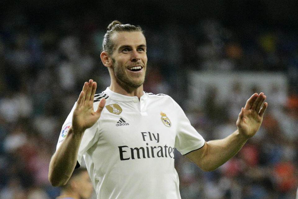 Gareth Bale festeja tras marcar el segundo gol del Real Madrid ante Getafe en la liga española, el domingo 19 de agosto de 2018. (AP Foto/Andrea Comas)