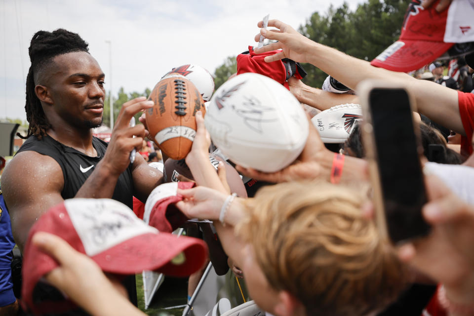 Bijan Robinson has fans and teammates excited about the future in Atlanta. (AP Photo/Alex Slitz)
