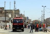 Central Baghdad blasts kill at least 18: police