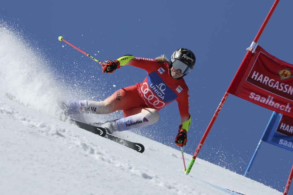 Switzerland's Lara Gut Behrami competes during the first run of an alpine ski, women's World Cup giant slalom race, in Saalbach, Austria, Sunday, March 17, 2024. (AP Photo/Marco Trovati)