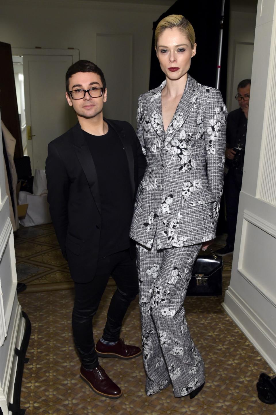 <p>Coco Rocha opted for a monochrome suit with floral embroidery. <i>[Photo: Getty]</i> </p>