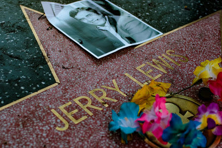 A makeshift memorial appears for late comedian, actor and entertainer Jerry Lewis around his star on the Hollywood Walk of Fame in Los Angeles, California, U.S. August 20, 2017. REUTERS/Kyle Grillot