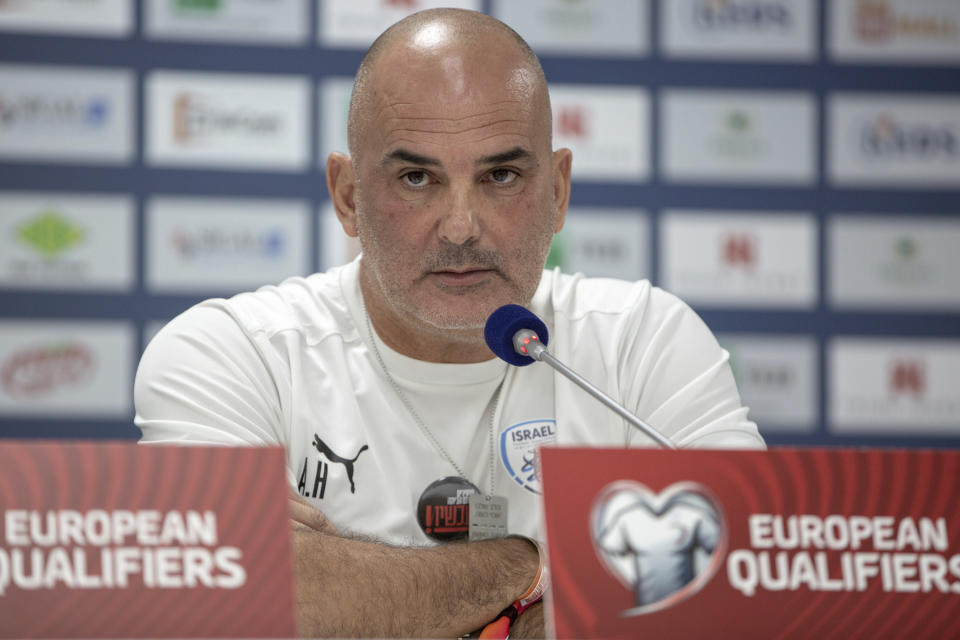 Israeli head coach Alon Hazan speaks during a press conference before the training session for the Euro 2024 group I qualifying soccer match between Kosovo and Israel at the Fadil Vokrri stadium in Pristina, Kosovo, Saturday, Nov. 11 2023. (AP Photo/Visar Kryeziu)