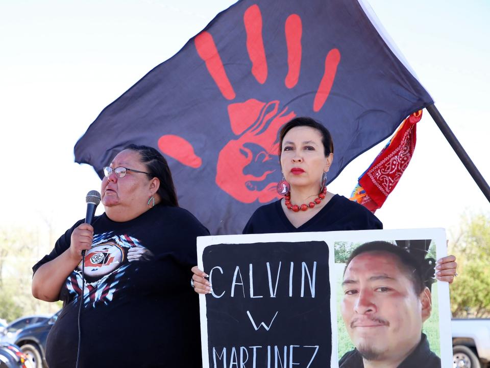 At left, Becky Martinez talks about her brother, Calvin Willie Martinez, who has been missing since May 2019, during the rally for missing and murdered Indigenous women and people awareness day on May 5 in Farmington.