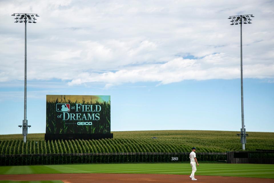 Cubs starter Drew Smyly (11) walks on the field before a Major League Baseball game against the Cincinnati Reds on Thursday.