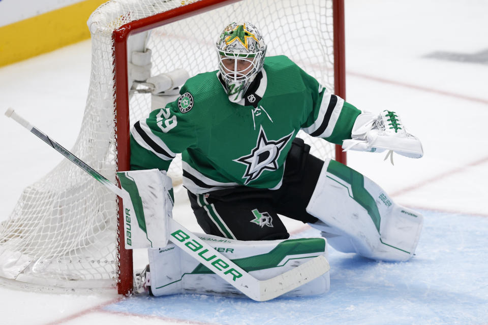 Dallas Stars goaltender Jake Oettinger defends his net against the Vegas Golden Knights during the third period in Game 7 of an NHL hockey Stanley Cup first-round playoff series, Sunday, May 5, 2024, in Dallas. The Stars won 2-1. (AP Photo/Brandon Wade)