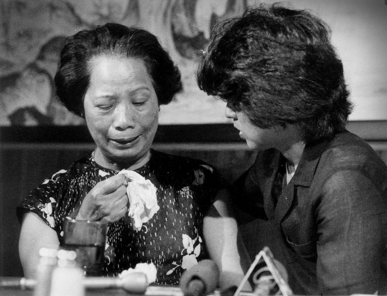 Lily Chin, left, is comforted by Helen Zia, president of American Citizens for Justice, as Chin starts to cry, during a press conference in Ferndale following the verdicts in the Ebens/Nitz trial.