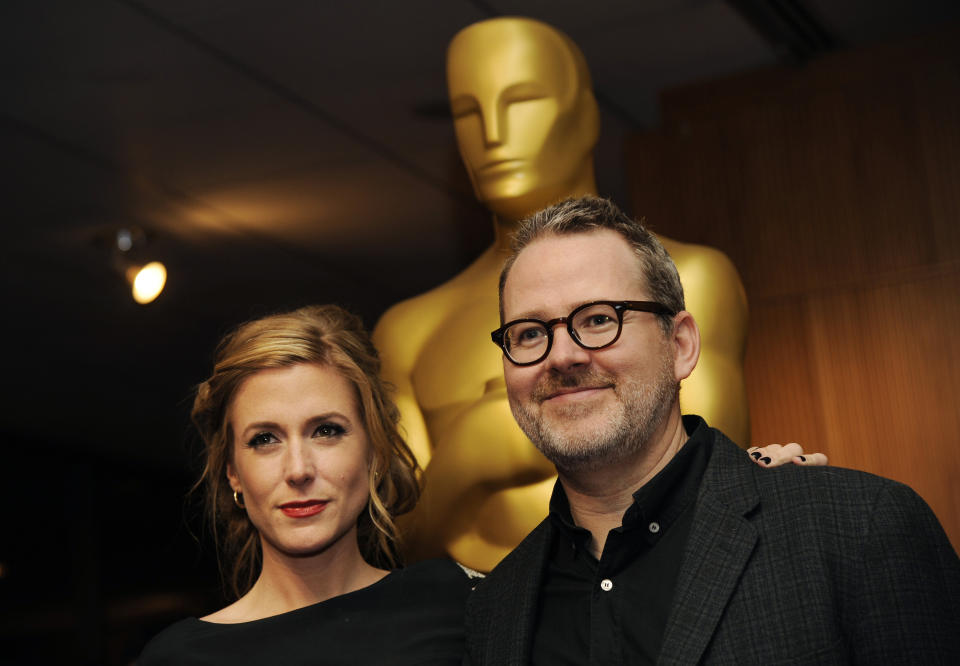 Morgan Neville, right, director and co-producer of the Oscar-nominated documentary film "20 Feet from Stardom," and fellow co-producer Caitrin Rogers pose together at a reception featuring the Oscar nominees in the Documentary Feature and Documentary Short Subject categories on Wednesday, Feb. 26, 2014, in Beverly Hills, Calif. The Oscars will be held on Sunday at the Dolby Theatre in Los Angeles. (Photo by Chris Pizzello/Invision/AP)