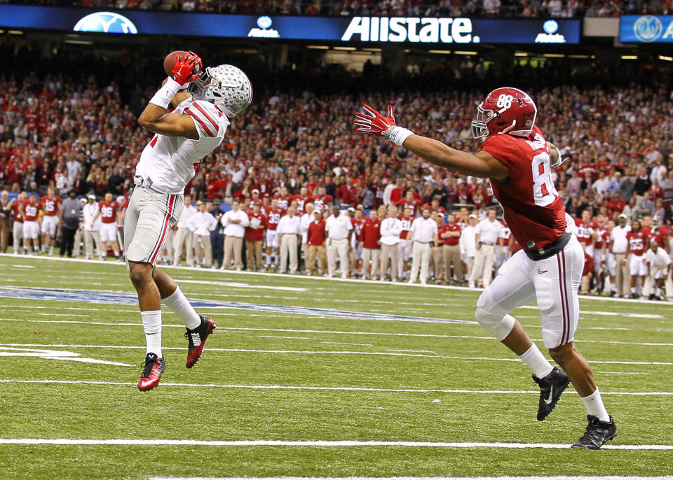 January 1, 2015: Ohio State Buckeyes defensive back Vonn Bell (11) makes an interception over Alabama Crimson Tide tight end O.J. Howard (88) during the Ohio State Buckeyes game versus the Alabama Crimson Tide in their College Football Playoff Semifinal played in the Allstate Sugar Bowl at the Mercedes-Benz Superdome in New Orleans, LA. The Ohio State Buckeyes won 42-35. (Photo by Todd Kirkland/Icon Sportswire/Corbis/Icon Sportswire via Getty Images)