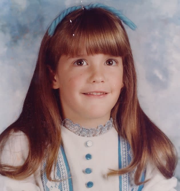 Cyndy Etler in her first-grade class picture, taken shortly after her mother married her abusive stepfather.