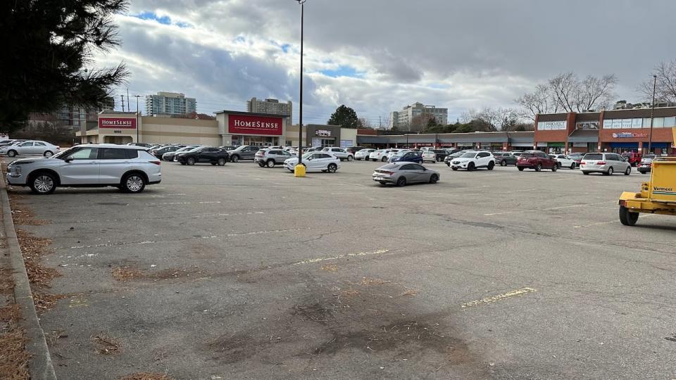 Mississauga city council approved this parking lot and plaza for housing 10 years ago, but the developer has yet to start building. 