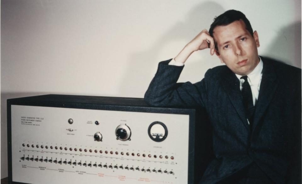 Stanley Milgram with the make-believe "shock" generator used in his experiments that showed how people would follow inhumane and sadistic orders if they came from voices of authority.