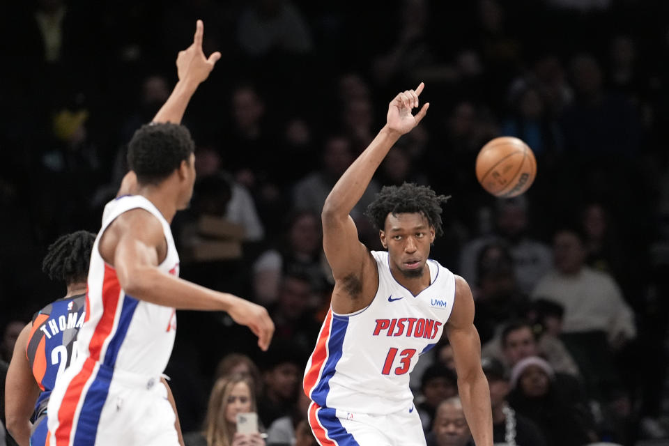 Detroit Pistons center James Wiseman (13) and guard Jaden Ivey, left, reacts during the first half of an NBA basketball game against the Brooklyn Nets, Saturday, April 6, 2024, in New York. (AP Photo/Mary Altaffer)