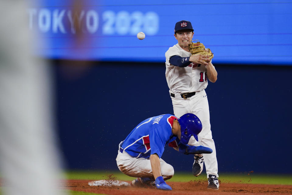 United States' Nick Allen throws to first after forcing out South Korea's Hae Min Park during a semi-final baseball game at the 2020 Summer Olympics, Thursday, Aug. 5, 2021, in Yokohama, Japan. (AP Photo/Sue Ogrocki)