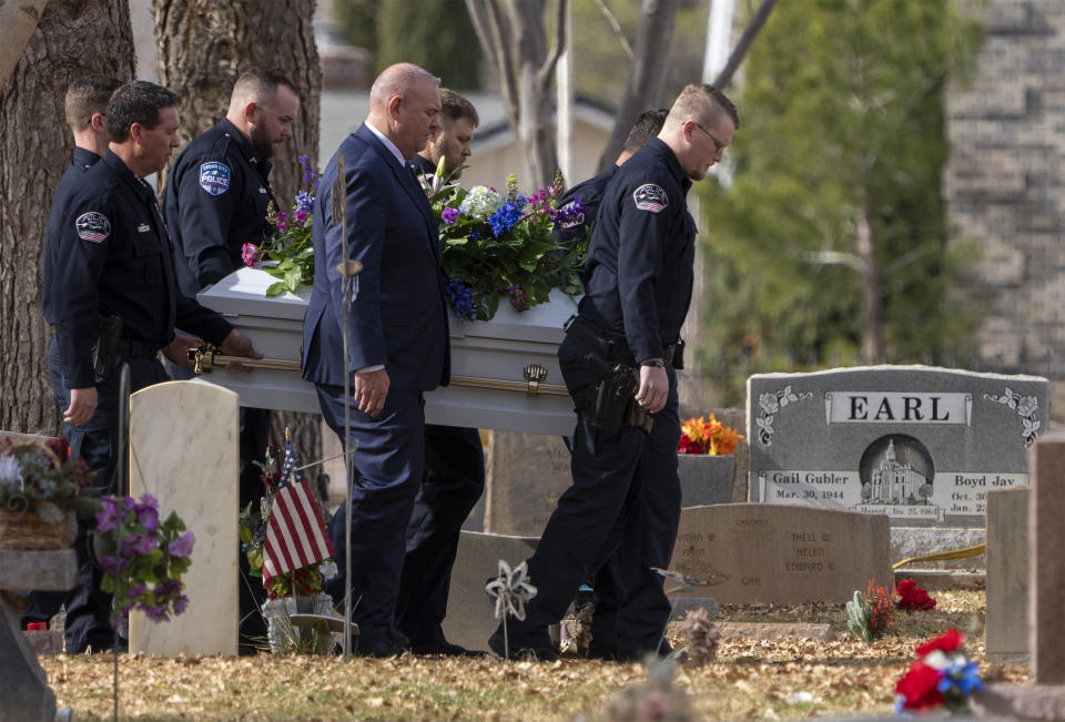 Pallbearers carry a casket to the graveside service for the Haight and Earl families in La Verkin, Utah, on Friday, Jan. 13, 2023, in La Verkin, Utah. Tausha Haight, her mother, Gail Earl, and her five children were shot and killed by her husband Jan. 4. (Rick Egan/The Salt Lake Tribune via AP)
