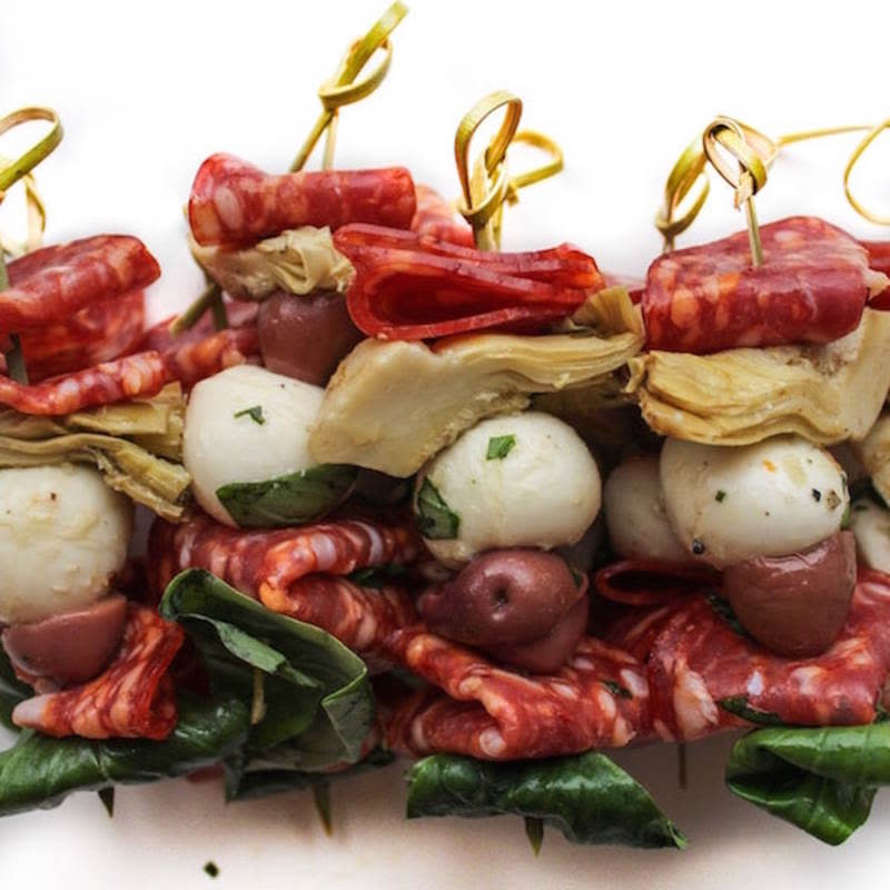 <p>A Saucy Kitchen</p><p>Make sure you grab one of these skewers before they disappear! </p><p><strong>Get the recipe: <a href="https://www.asaucykitchen.com/antipasto-skewers/" rel="nofollow noopener" target="_blank" data-ylk="slk:Antipasto Skewers with Marinated Mozzarella Balls;elm:context_link;itc:0;sec:content-canvas" class="link ">Antipasto Skewers with Marinated Mozzarella Balls</a></strong></p>