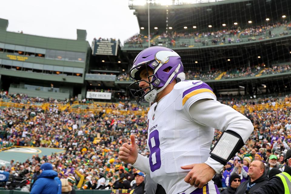 GREEN BAY, WISCONSIN - OCTOBER 29: Kirk Cousins #8 of the Minnesota Vikings takes to the field prior to a game against the Green Bay Packers at Lambeau Field on October 29, 2023 in Green Bay, Wisconsin. (Photo by Michael Reaves/Getty Images)