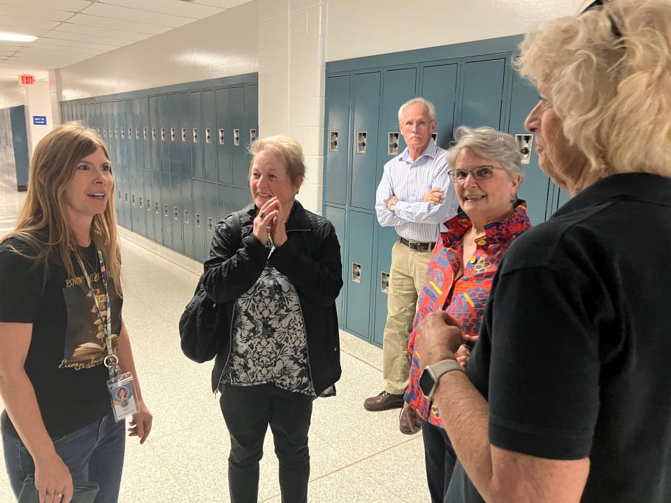 Scarlett Kiser, far left, will retire when Beverley Manor Middle School closes this year. She has spent all of her 30 years teaching at the school. Thursday night, during an open house, she got to catch up with some retired BMMS teachers (clockwise from left) Joan Wright, Beverley Wise and Kathy Morzark.