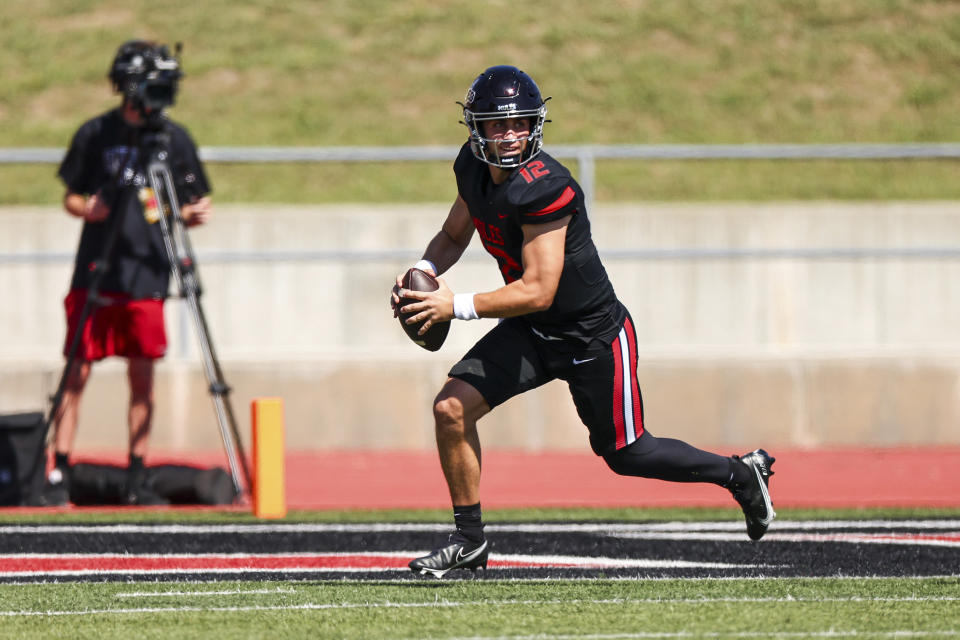 UCM Mules quarterback Zach Zebrowski runs during an MIAA college football game in Warrensburg, Mo., on Oct. 21, 2023. Central Missouri quarterback Zebrowski, who passed for 5,157 yards, and five players from the Colorado School of Mines were selected to The Associated Press Division II All-America team announced Wednesday, Dec. 13, 2023. (Andrew Mather Photography via AP)