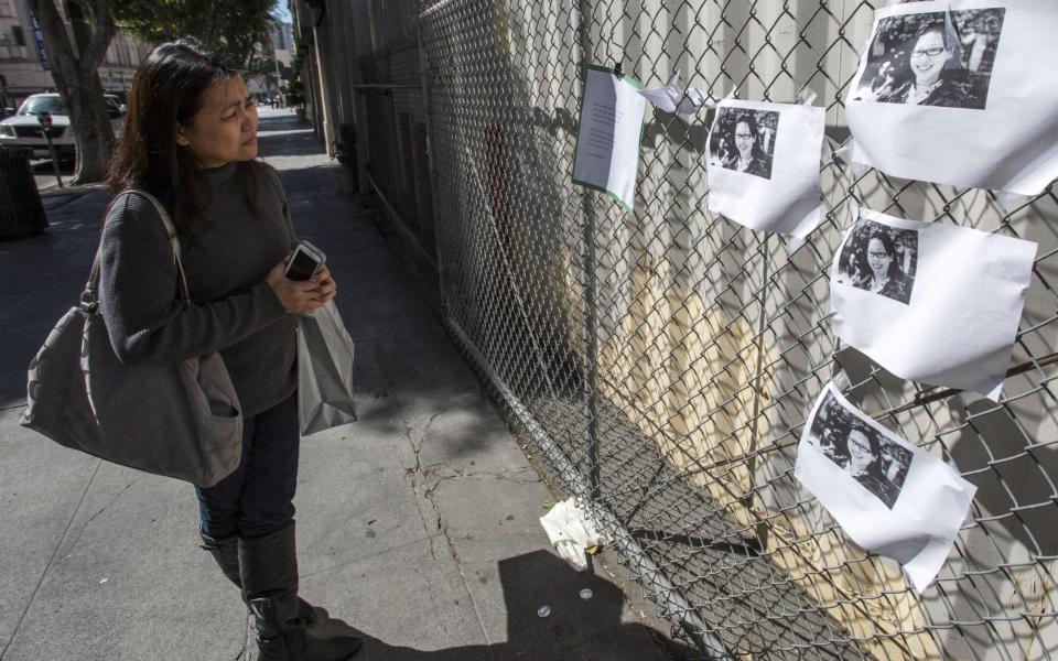 A memorial to Elisa Lam outside the Hotel Cecil, February 2013 - Alamy