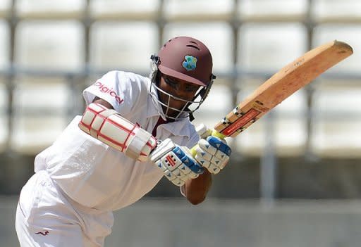 West Indies batsman Shivnarine Chanderpaul plays a shot during the third day of the third Test match against Australia in Roseau, Dominica, on April 25