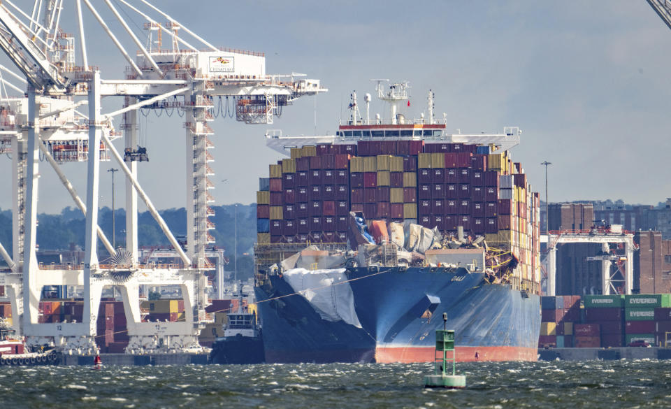 The container ship Dali pulls away from the Seagirt Marine Terminal on its way to Norfolk, Monday, June 24, 2024, nearly three months after the ship hit a support pier of the Francis Scott Key Bridge causing a catastrophic collapse. (Jerry Jackson/The Baltimore Sun via AP)