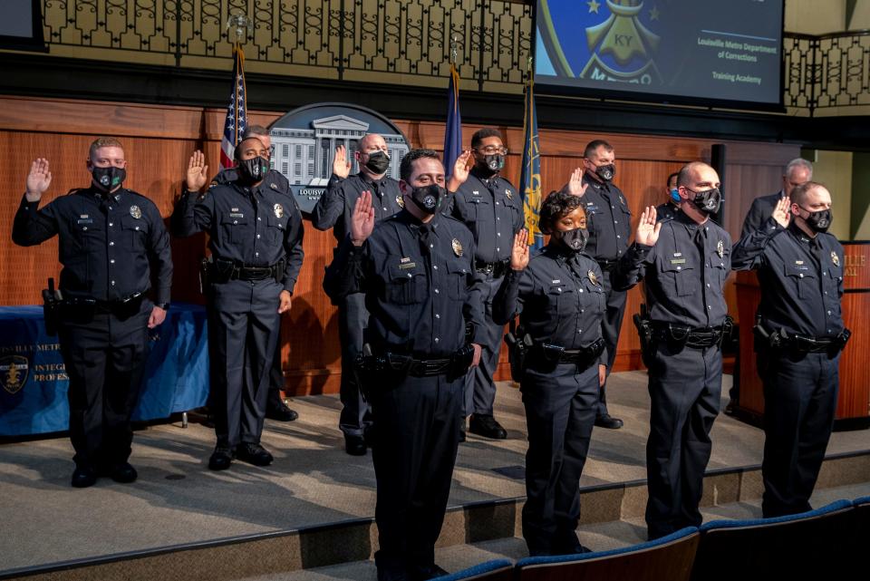 The 2022 class of Louisville Metro Corrections officers, CTAC 131, are sworn in at Metro Hall. Feb. 9, 2022