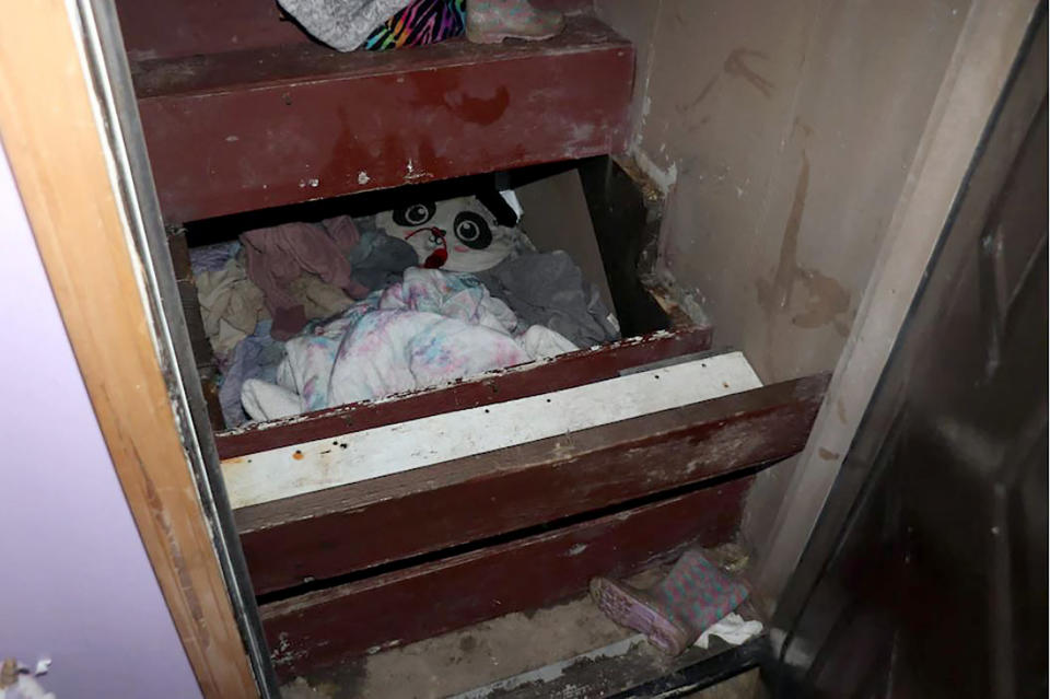 This February 14, 2022, image courtesy of the Saugerties Police Department in New York shows the hiding place under a staircase where Paislee Shultis was found in Sugerties. The six-year-old girl missing for over two years was found hidden in the 