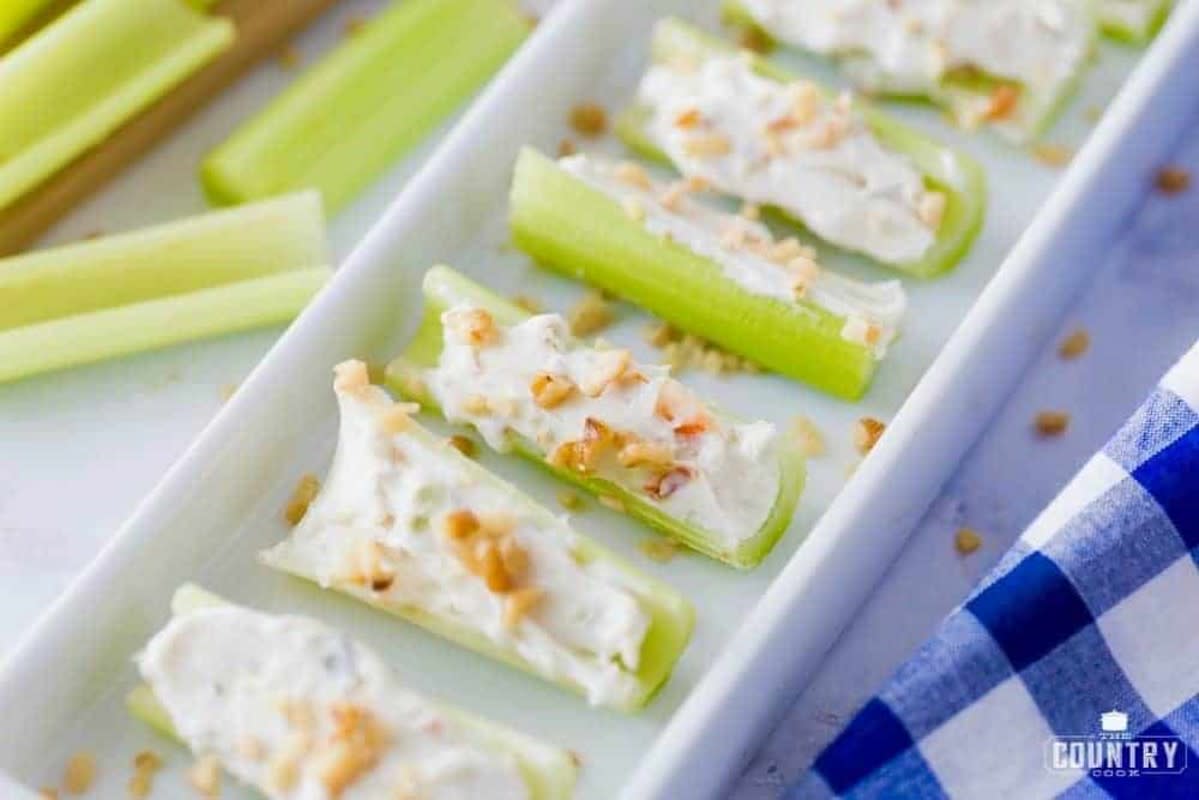 <p>The Country Cook</p><p>You have to love appetizers that are both simple and budget-friendly.</p><p><strong>Get the recipe: <a href="https://www.thecountrycook.net/stuffed-celery/" rel="nofollow noopener" target="_blank" data-ylk="slk:Cream Cheese Stuffed Celery;elm:context_link;itc:0;sec:content-canvas" class="link rapid-noclick-resp">Cream Cheese Stuffed Celery</a></strong></p>