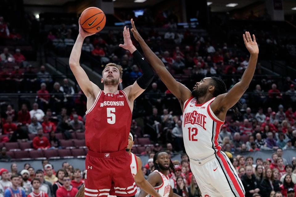 Wisconsin forward Tyler Wahl (5) shoots in front of Ohio State guard Evan Mahaffey (12) during an NCAA men's college basketball game on Jan. 10 in Columbus, Ohio. The two teams will square off again Tuesday night.