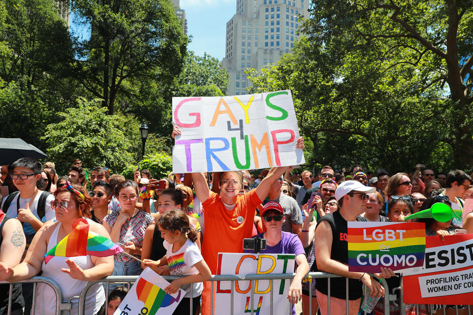 <p>A Hillary Clinton impersonator holds up “Gays for Trump” sign during the N.Y.C. Pride Parade in New York on June 25, 2017. (Photo: Gordon Donovan/Yahoo News) </p>