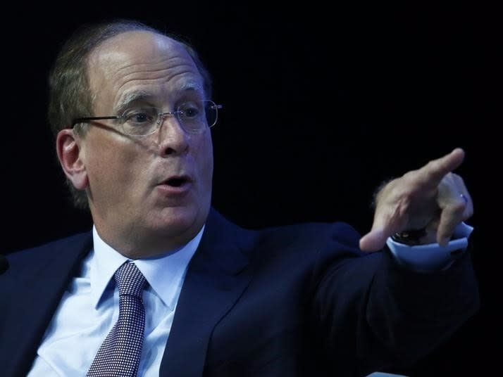 Laurence Fink, Chairman and CEO of Blackrock Inc., gestures at the session 'The Global Economic Outlook' in the Swiss mountain resort of Davos January 24, 2015. REUTERS/Ruben Sprich 