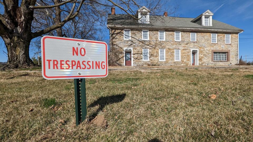 No trespassing signs surround the perimeter of the Hoke House in Spring Grove on Wednesday February 15, 2023. The demolition permit will be issued Thursday.