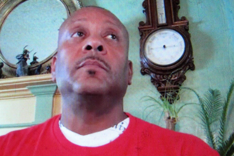 In this image taken from video, Jeffery Payne, a server in the VIP lounge at Caesars casino in Atlantic City, N.J., discusses the continuing unemployment of many casino workers during an online meeting from his home, Wednesday, July 8, 2020. Many Atlantic City casino workers were ready to return to work on July 2 until Gov. Phil Murphy banned indoor dining due to the virus outbreak, preventing casinos from opening their restaurants and canceling plans to bring these workers back. (AP Photo/Wayne Parry)