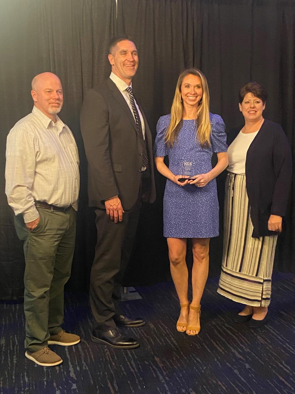 Geography teacher Rebecca Nutter of Bearden High, third from left, is shown after being named Knox County Schools teacher of the year for the high school division on Feb. 28. With her are, from left, board member Daniel Watson, superintendent Dr. Jon Rysewyk and board member Kristi Kristy.