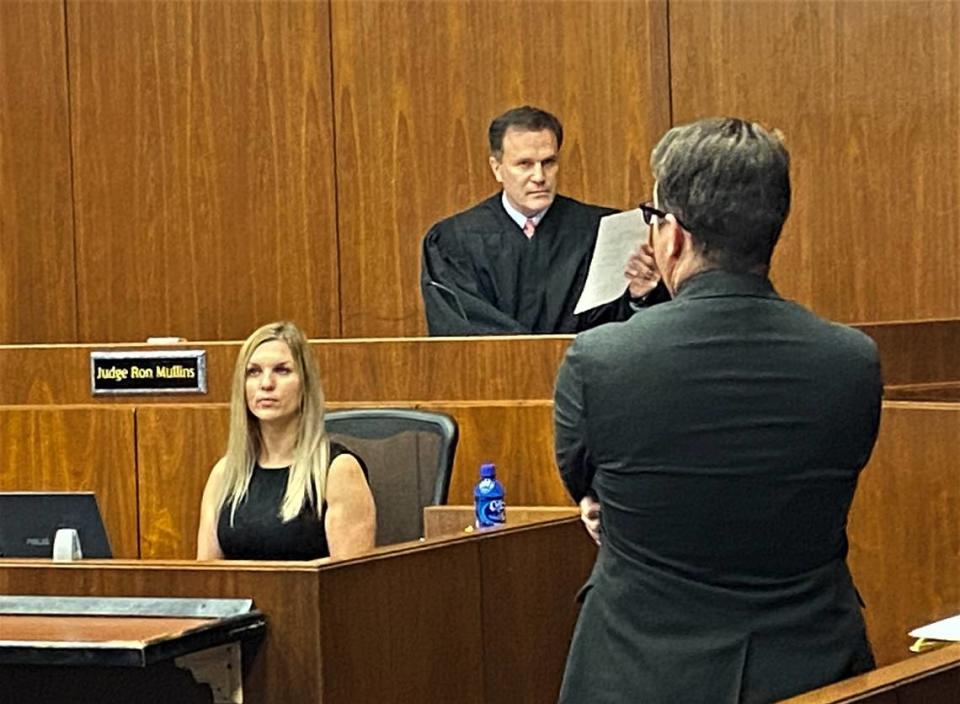 Judge John Martin listens as prosecutor Christopher Georgia explains the charges against Santonio Williams in the 2020 death of Samuel London.