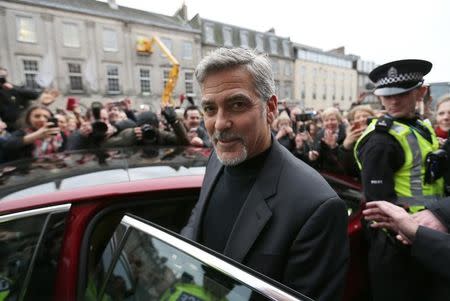 Hollywood actor George Clooney leaves Tiger Liley restaurant in Edinburgh, Scotland. November 12, 2015. REUTERS/Russell Cheyne