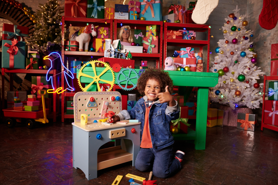 Sebastian from the John Lewis Toy Testing panel is hoping for a wooden workbench this Christmas. (Image: John Lewis)
