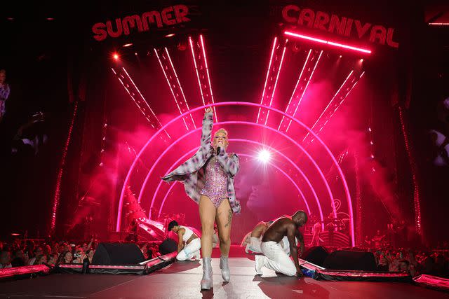 <p>Kevin Mazur/Getty Images for Live Nation</p> Pink performs in Toronto in July 2023