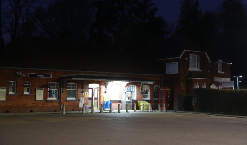 The scene at Horsley station, in Surrey, where police and paramedics were called after a man was murdered onboard the 12.58pm service from Guildford to London Waterloo. (PA)