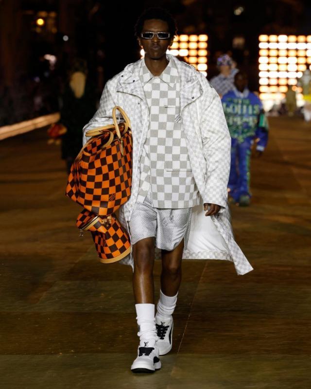 For his first Louis Vuitton Men's collection, Pharrell Williams presented a  solid collection of clothes that referenced his wardrobe over…