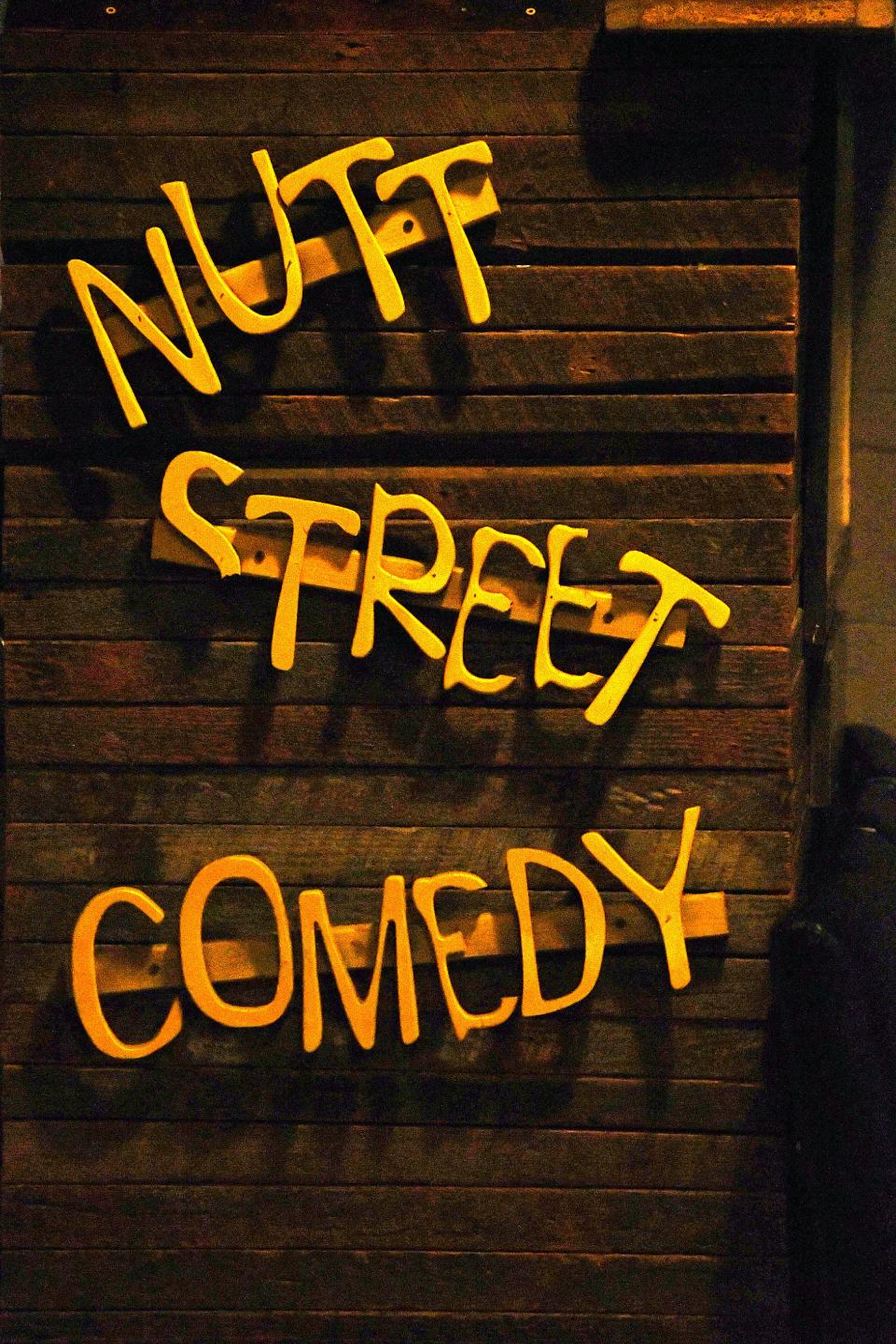 Sign at Wilmington's Dead Crow Comedy Room pays homage to the club's origins as the Nutt Street Comedy Room.