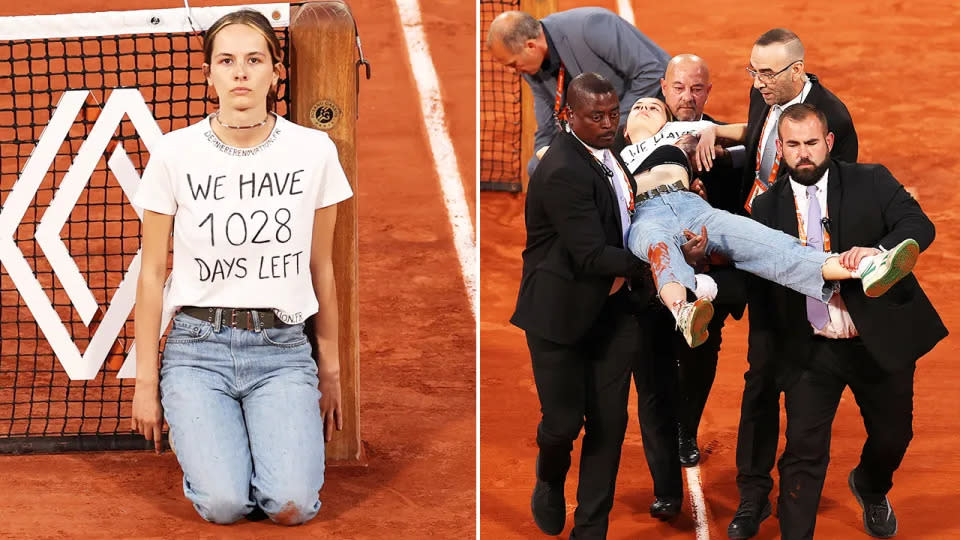 A protester tied herself to the net at the French Open and had to be removed by security guards. Image: Getty
