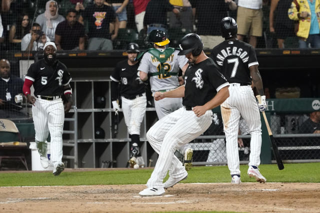 Sheets homers, doubles late to lift White Sox over A's 3-2