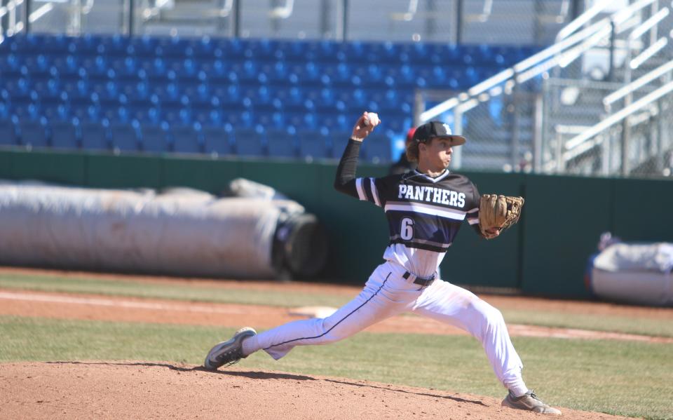 Piedra Vista's Kendrick Aragon warms up between innings of a second round game against Grants in the Scorpion Invitational, Friday, March 17, 2023 at Ricketts Park