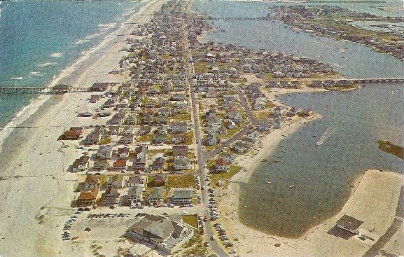 A postcard from 1963 shows the Surf Club in Wrightsville Beach, which was on the northernmost part of the island before Moore's Inlet was filled in in 1965.